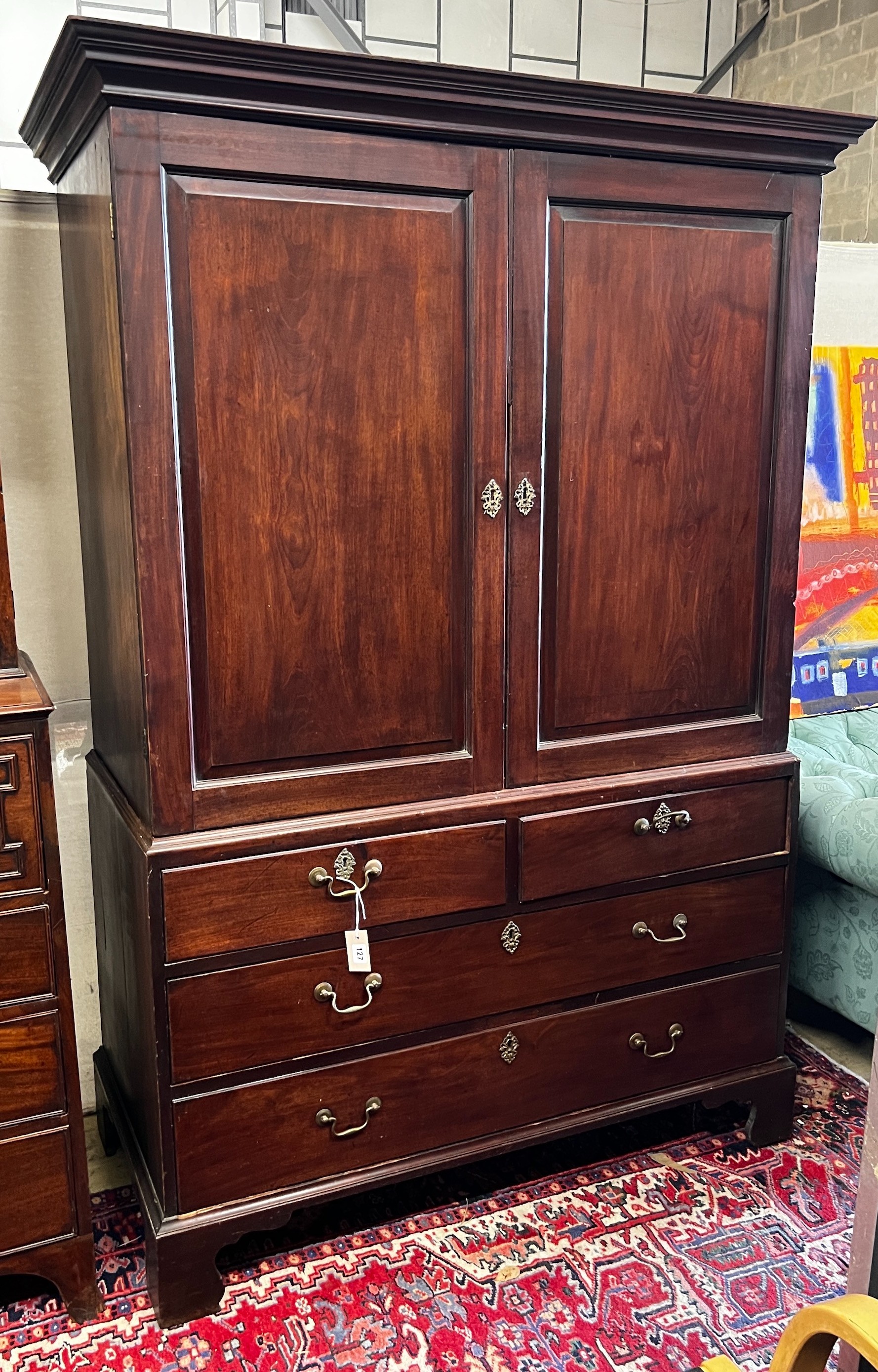 A George III mahogany linen press, width 130cm, depth 62cm, height 190cm